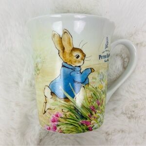 Peter Rabbit Floral blue jacket, bunny in field Ceramic coffee Mug